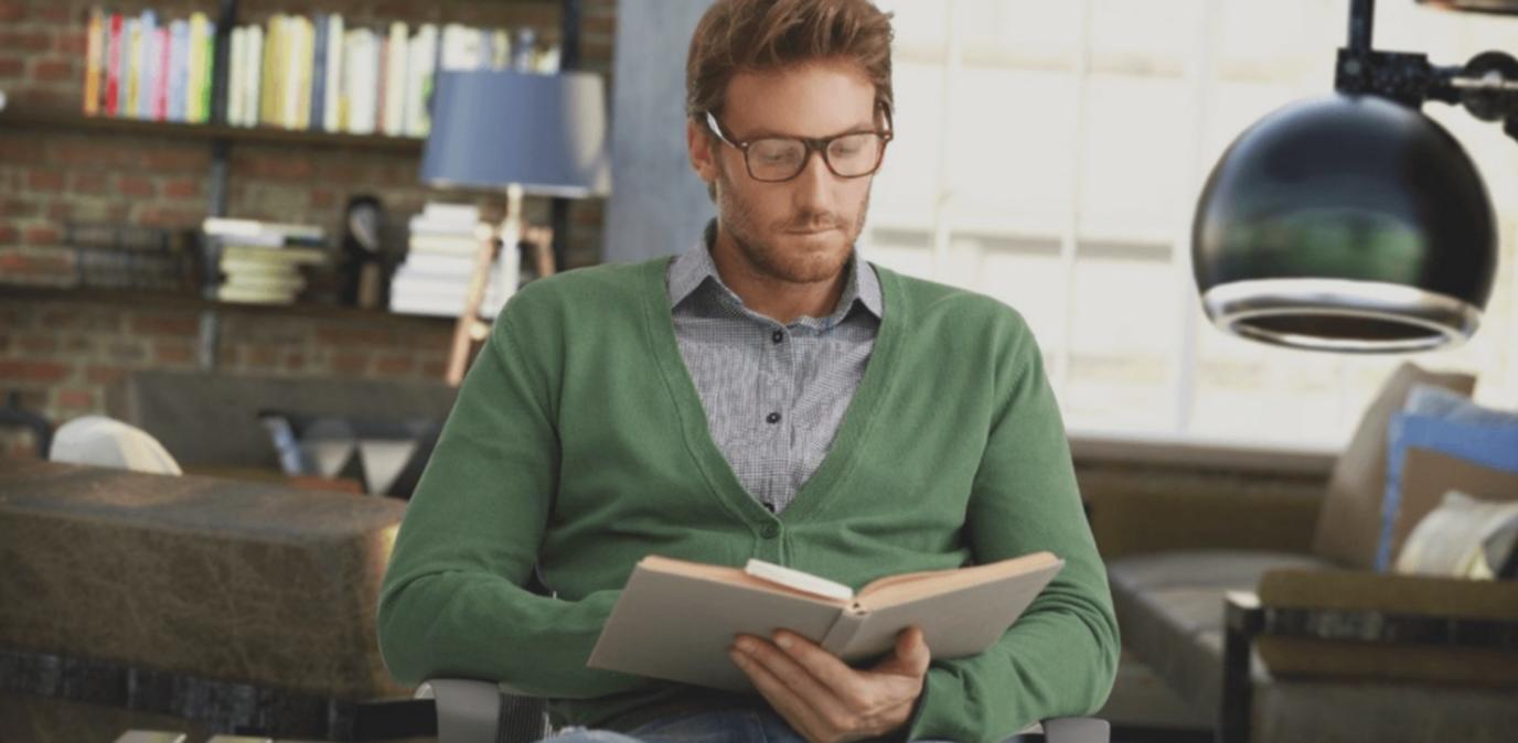 Student reviewing course materials and taking structured notes